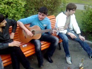 under the guitar. armenian sings